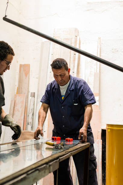 istock Employees of a locksmith are working on cutting material 1433828522