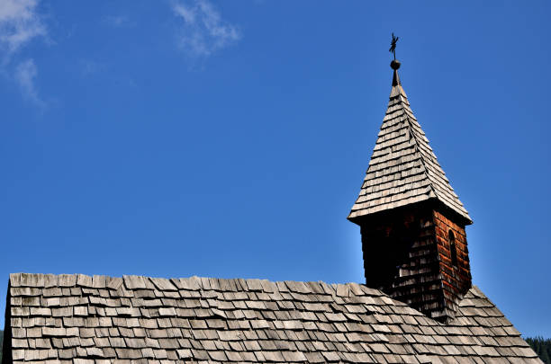 Shingle roof of a chapel in the woods of the Braies valley