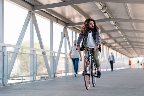 istock Cool Man Riding Bike 1433834308