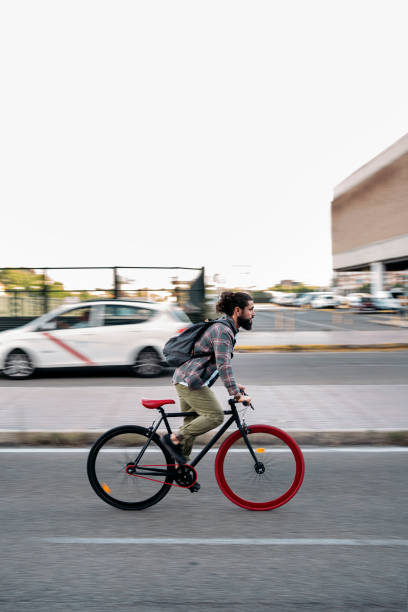 istock Bearded Man Riding his Bike 1433834533