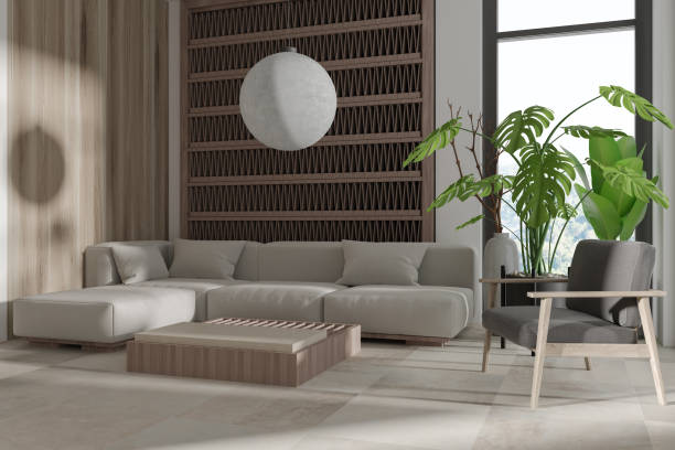 istock Light chill interior with couch and armchair with plant near panoramic window 1433836104