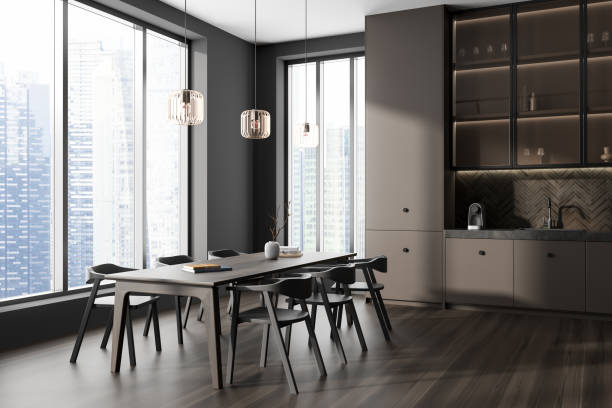 istock Grey kitchen interior with table and seats, cooking and dining area 1433836421