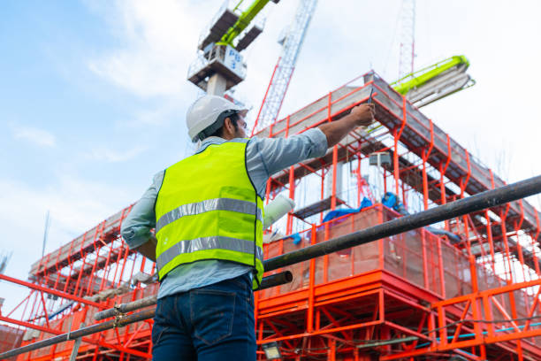 istock Structural engineers are coordinating with the drawing team to ensure the site meets the specifications stated in the contract. 1433839294