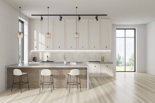 istock Light kitchen interior with bar island and seats, shelves and panoramic window 1433839517