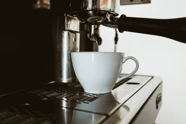 istock espresso machine in coffee shop counter offering freshly brewed coffee. coffee maker concept. 1433843484