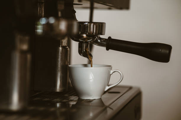 istock espresso machine in coffee shop counter offering freshly brewed coffee. coffee maker concept. 1433845490