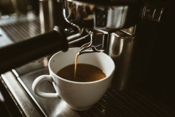 istock espresso machine in coffee shop counter offering freshly brewed coffee. coffee maker concept. 1433848267