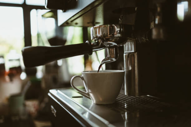 istock espresso machine in coffee shop counter offering freshly brewed coffee. coffee maker concept. 1433848756