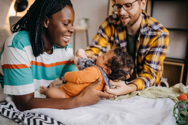 istock Happy parents and baby 1433849489