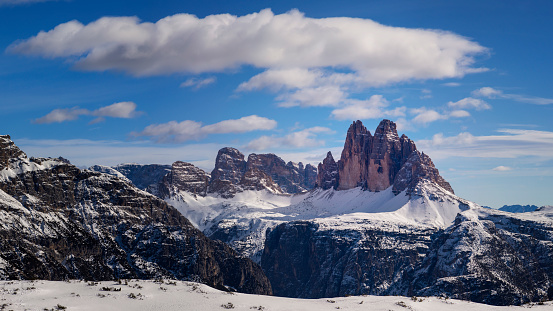 Tre Cime Di Lavaredo. The Three Peaks on Sunny Day in Winter. Aerial View. Sexten Dolomites, South Tyrol. Italy.