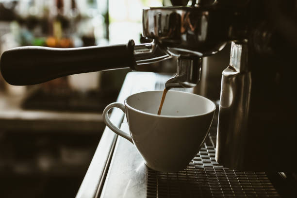 istock espresso machine in coffee shop counter offering freshly brewed coffee. coffee maker concept. 1433850273