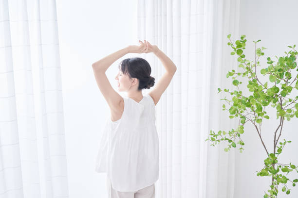 istock A woman taking a deep breath 1433850837