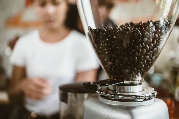 Coffee pot, coffee grinder at coffee shop.