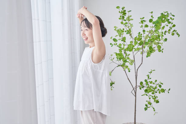 istock A woman taking a deep breath 1433851584
