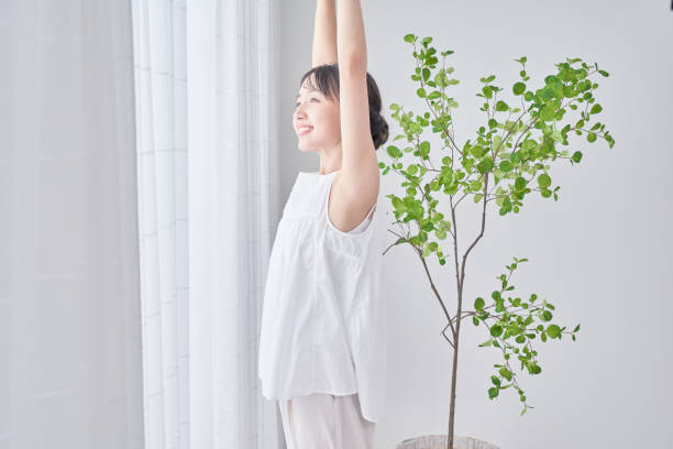 A woman taking a deep breath