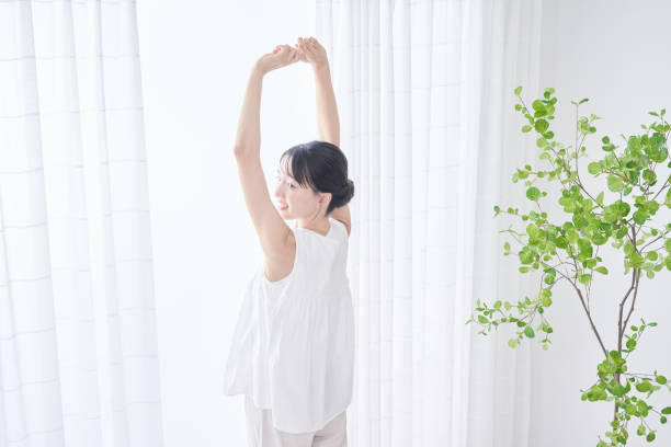 istock A woman taking a deep breath 1433851964
