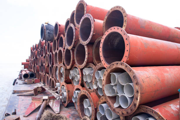 istock Rusted iron steel metal pipes stack an industrial field 1433852667