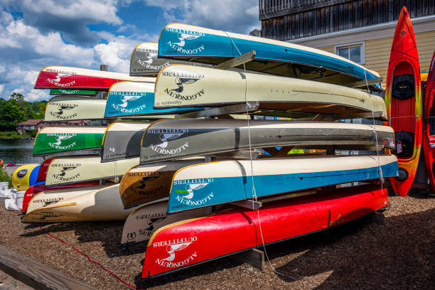 canoe rental station at Fairy Lake in Huntsville in Canada Huntsville, Canada - August 17, 2022:  Canoe rental station at Fairy Lake in Huntsville in Canada. It is part of the Algonquin Provincial Park. huntsville ontario stock pictures, royalty-free photos & images