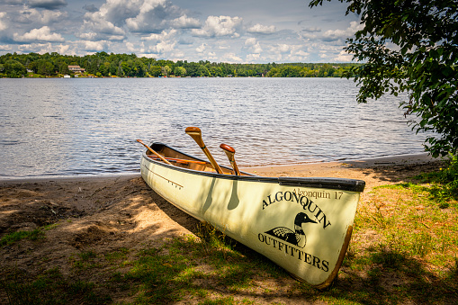 Huntsville, Canada - August 17, 2022:  Canoe at Fairy Lake in Huntsville in Canada. It is part of the Algonquin Provincial Park.