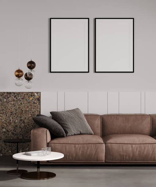 istock blank two frames mock up in modern living room interior with brown sofa, and palm tropical leaves, 3d rendering 1433855891