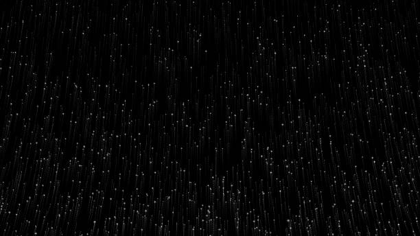 istock Glittering particles rising on a black background, particles 1433856278