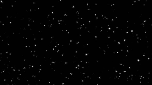 istock Glittering particles rising on a black background, particles 1433856321