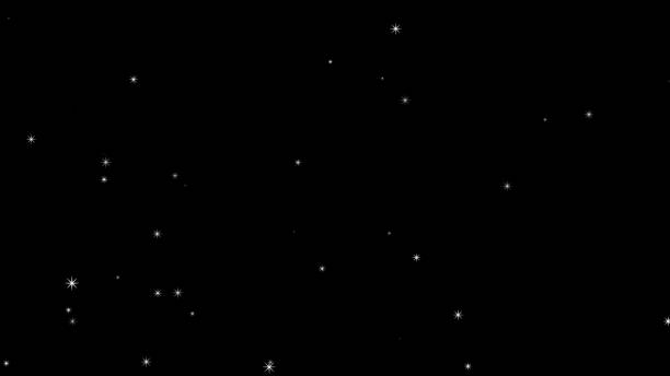istock Glittering particles rising on a black background, particles 1433856337