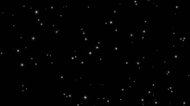 istock Glittering particles rising on a black background, particles 1433856340