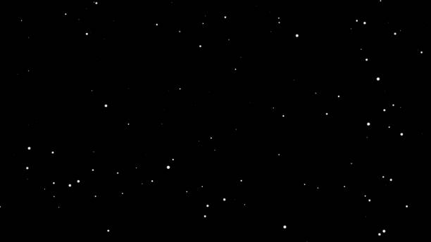istock Glittering particles rising on a black background, particles 1433856359