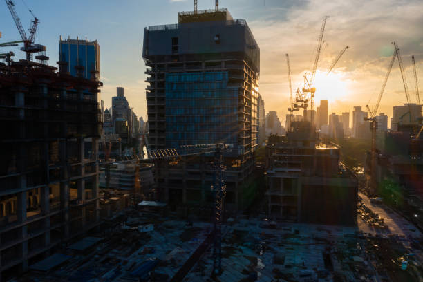 aerial view of construction site with tower crane urban construction rush hour of concrete pouring - foundation claude monet imagens e fotografias de stock
