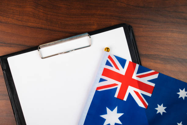istock template for text on clipboard with Australian flag, place for text document, laws, insurance, contract, record, Act 1433859672