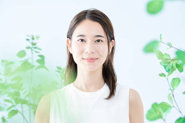 istock young woman surrounded by plants 1433860038