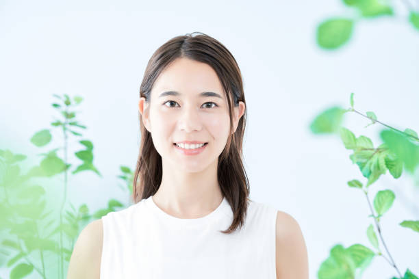 istock young woman surrounded by plants 1433860482