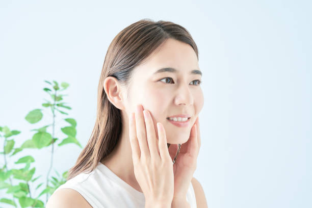 istock Young woman checking her skin condition 1433862069