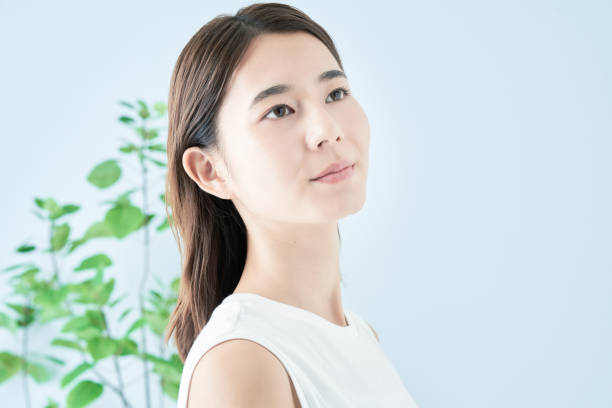istock Young woman checking her skin condition 1433862086