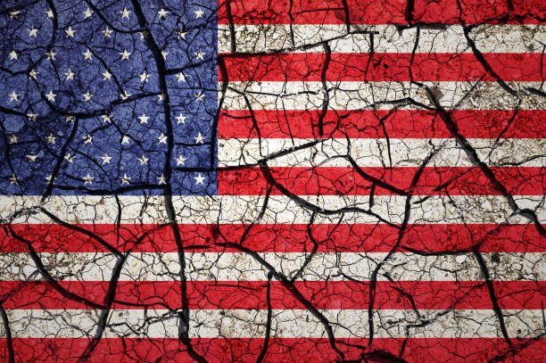 istock Dry soil pattern on the flag of United States. 1433862700