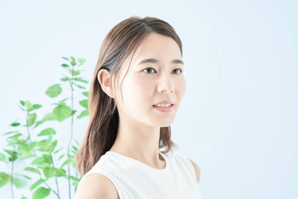 istock Young woman checking her skin condition 1433863013