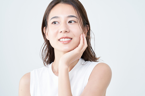 portrait of asian young woman and white background