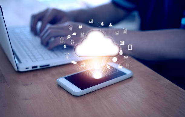 istock cloud graphic show with internet app for business medical document data technology at mobile phone on blur man work with laptop background 1433865238