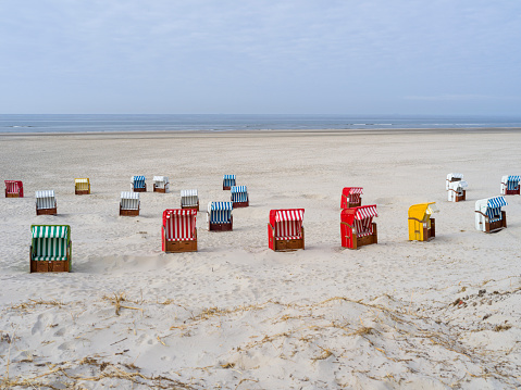 Hodded beach chairs on the island of Juist, Germany