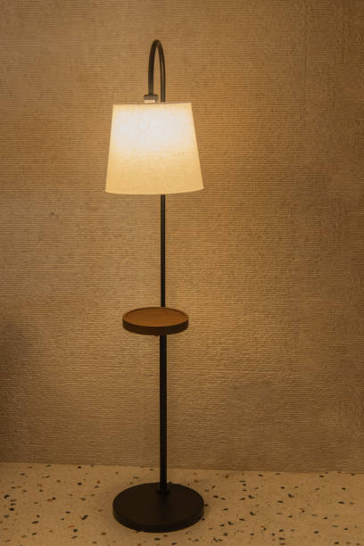 istock vintage floor lamp with a steel base and mid height table 1433872720