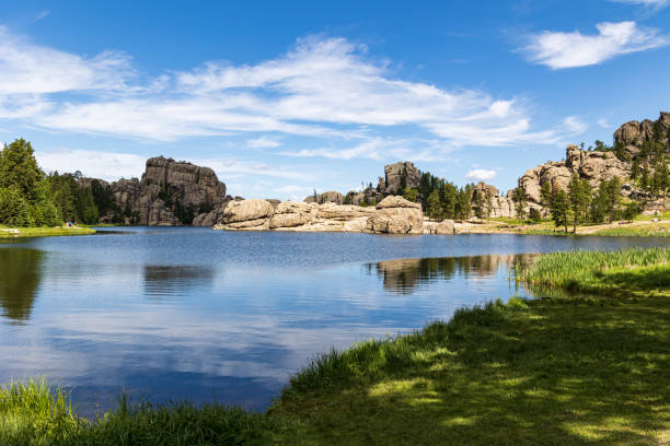 istock Clouds reflecting in Sylvan Lake, Custer State Park, South Dakota, USA 1433876821