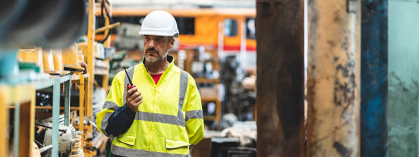 istock professional technician engineer with safety hard hat working to maintenance construction equipment in industrial factory, inspection man having manufacturing occupation job of production technology 1433878568