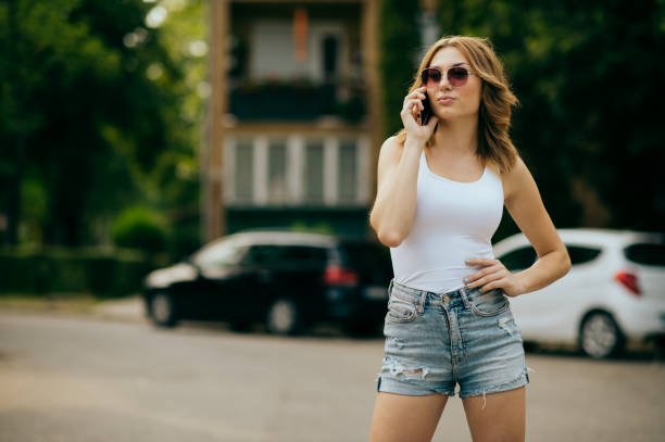 istock teenager girl using smart phone 1433882420