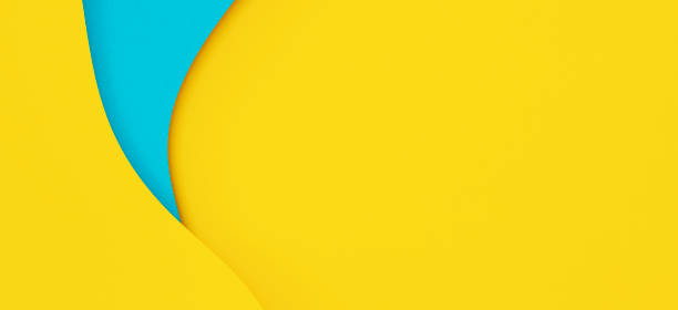 istock Abstract creative colored paper geometry composition banner background in bright yellow and light blue colors with curved lines 1433889388