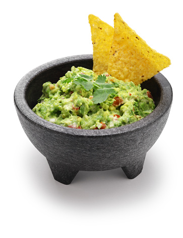homemade guacamole with tortilla chips, Mexican appetizer
