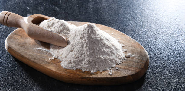 istock Wheat flour on the wooden cutting board 1433891634