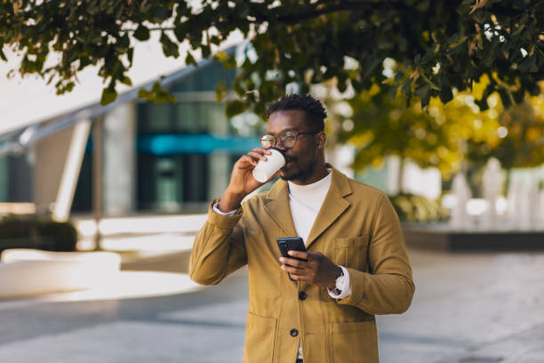istock Young and modern freelancer drinking his coffee to go 1433893920