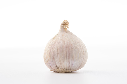 Close up pure garlic isolated on white background.