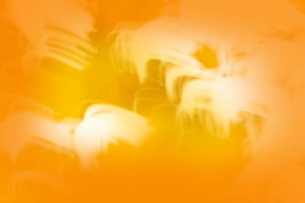 Blurry yellow orange color bokeh backdrop.Orange and yellow bokeh.